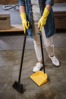 woman sweeping in Peterborough Ontario